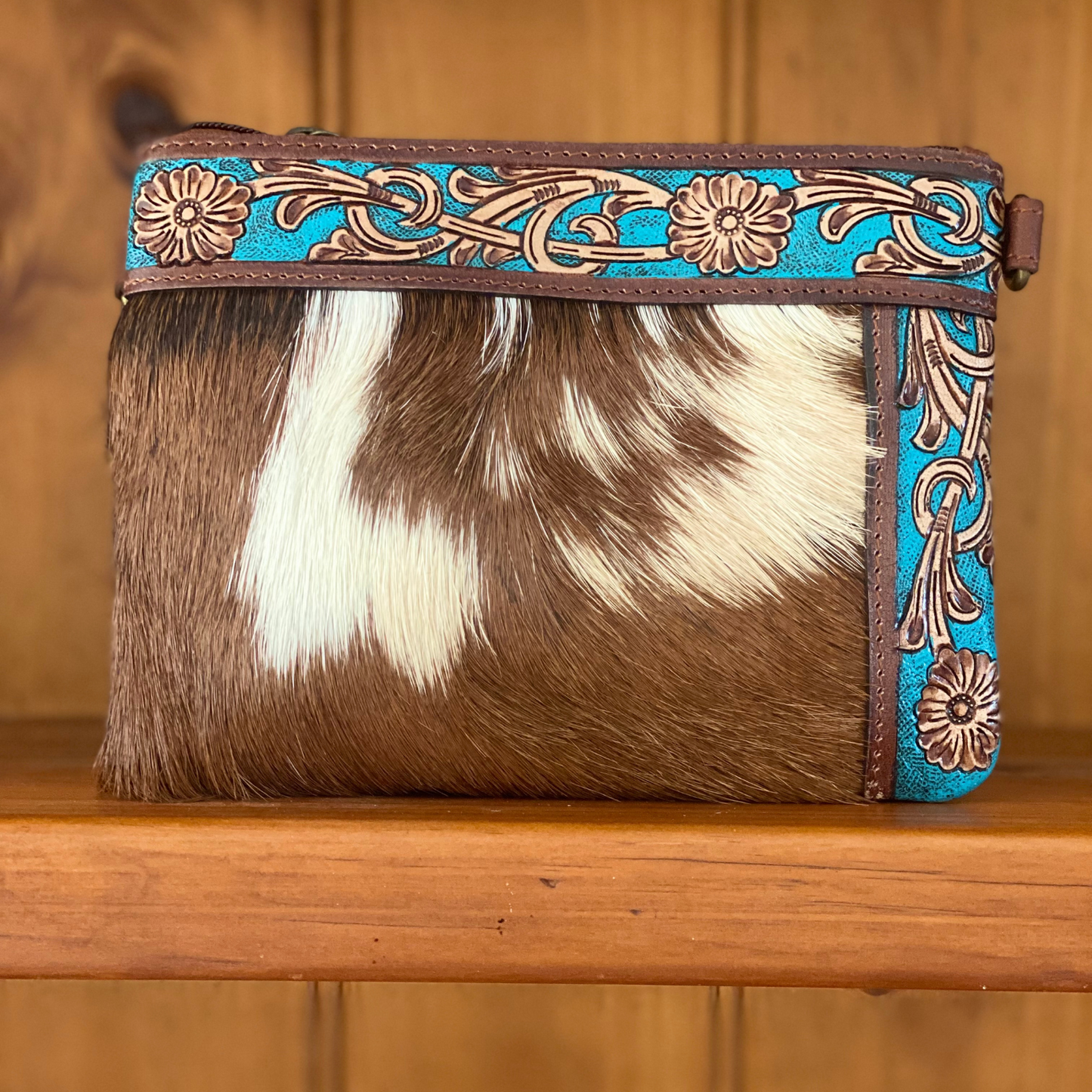 cowhide purse, embossed leather, flowers, handcarvd leather, handtooled leather, wrist purse, blue, yellow, white, brown, black
