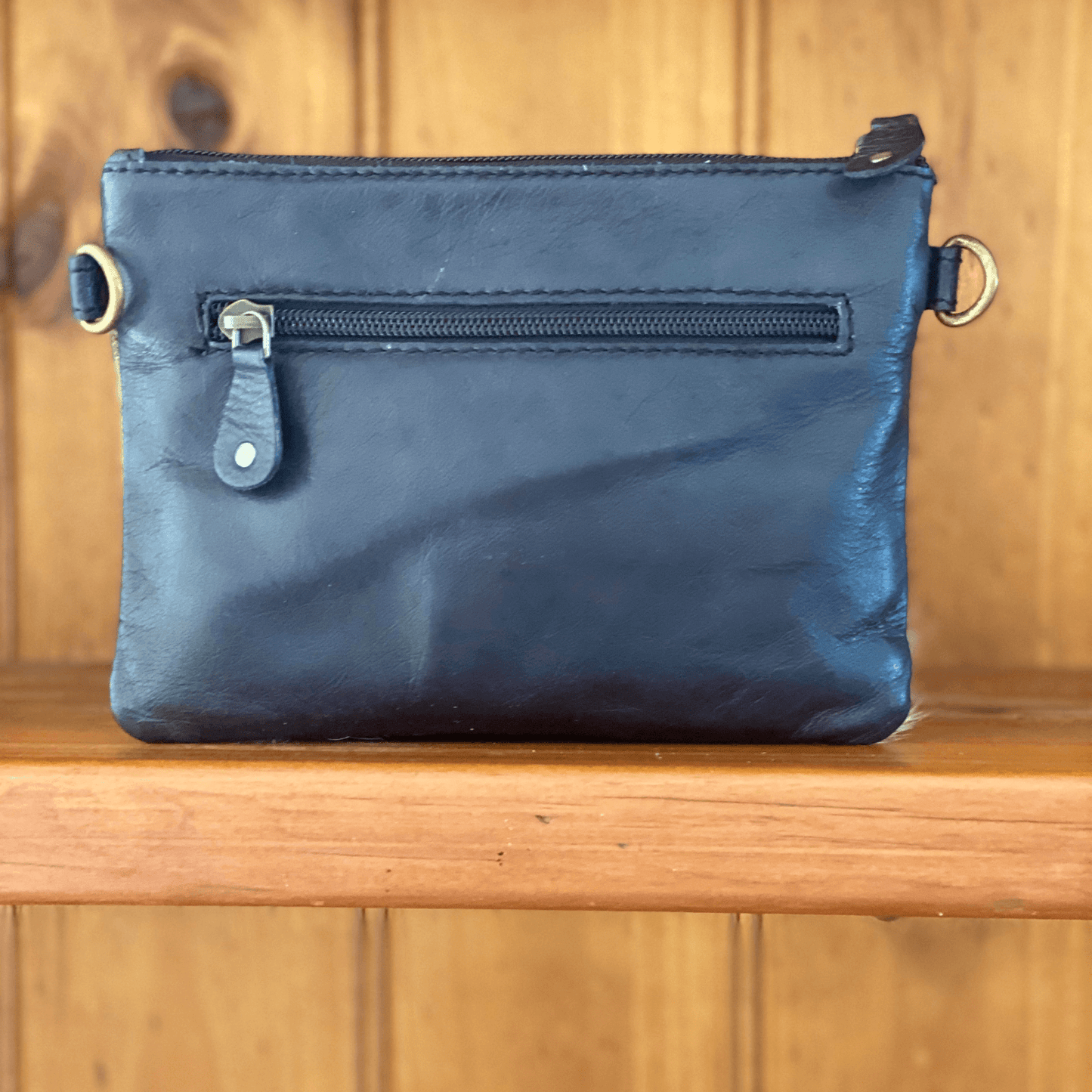 cowhide purse, embossed leather, flowers, handcarvd leather, handtooled leather, wrist purse, blue, yellow, white, brown, black