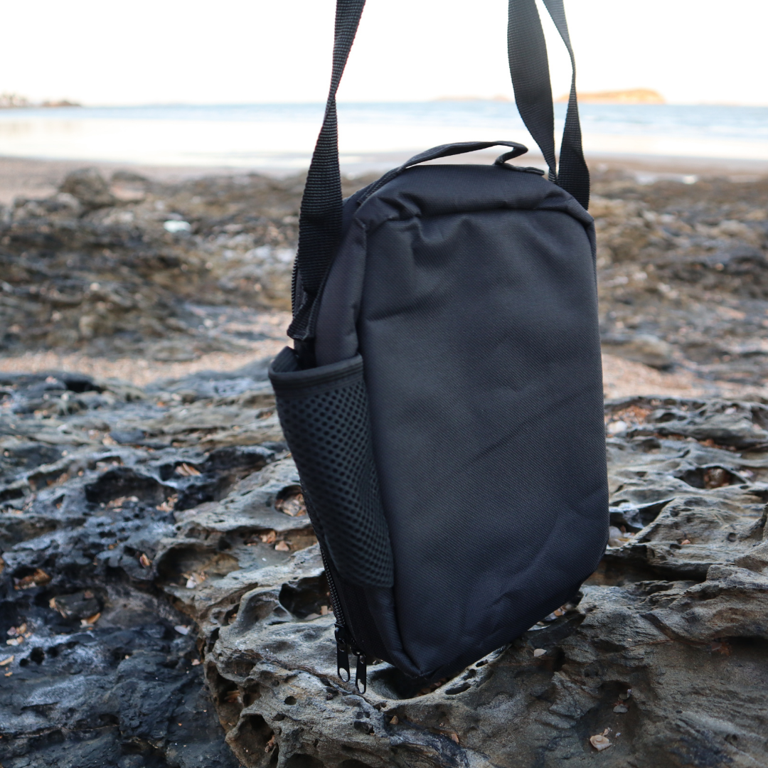 Side view of Heelers lunch bag showing bottle pocket and zip closure – AWTB Apparel