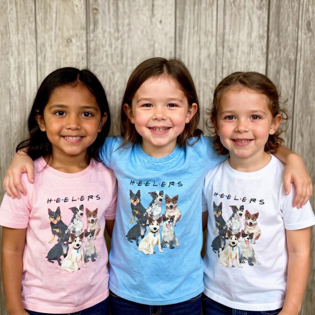 Kids H.E.E.L.E.R.S T-Shirt by AWTB Apparel – white cotton tee featuring six Blue and Red Heelers inspired by the Friends TV show