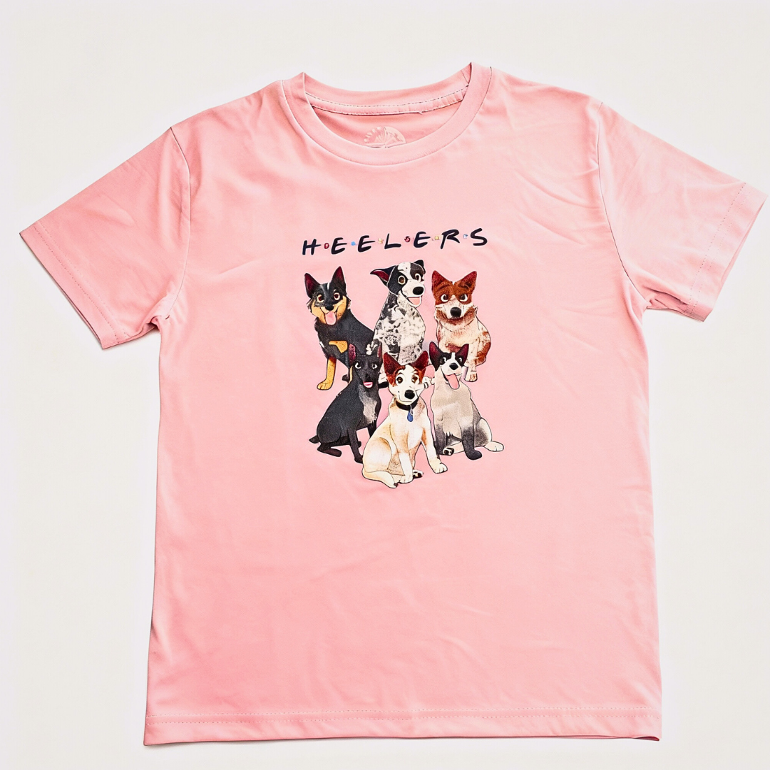 Baby pink H.E.E.L.E.R.S kids tee with six cartoon cattle dogs – AWTB Apparel Australian children’s shirt