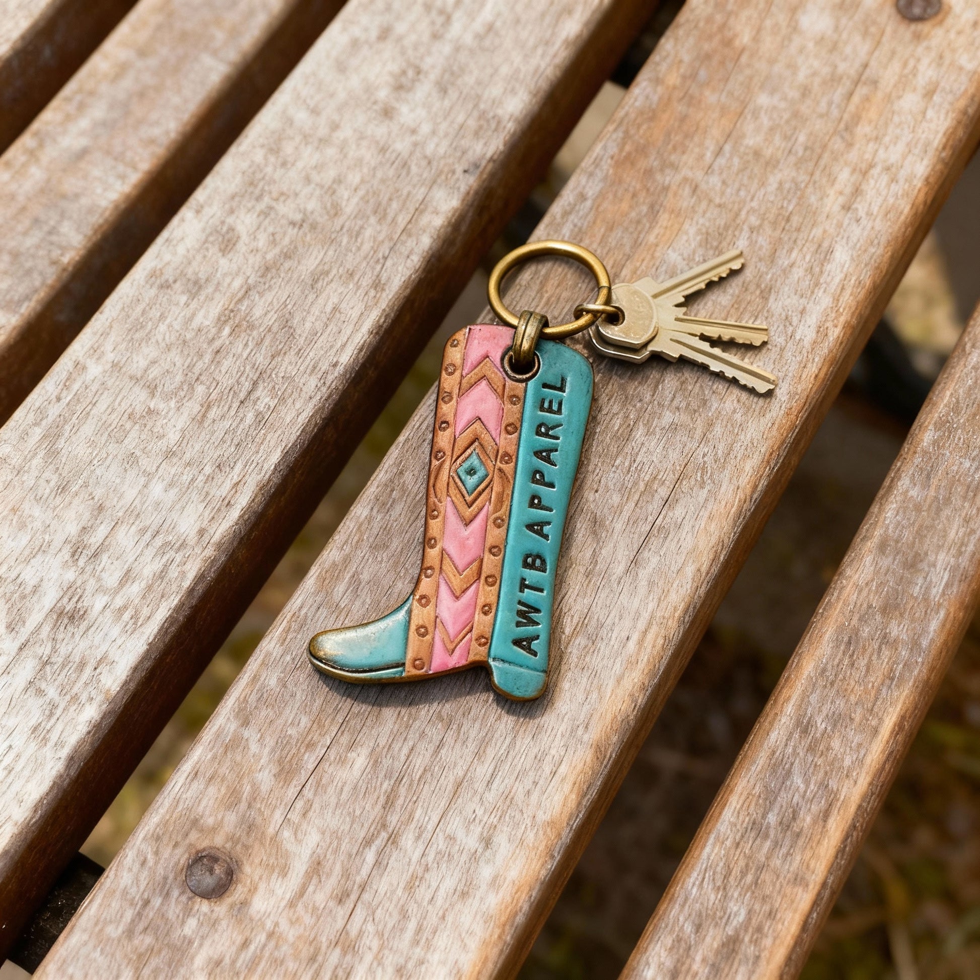 Close-up detail of western boot keychain charm with key ring