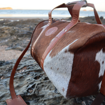 Cowhide discount travel bag